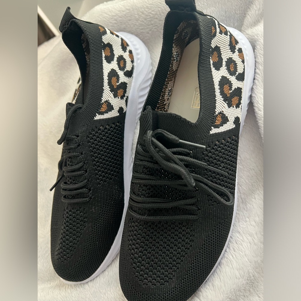Women’s leopard print sneakers.